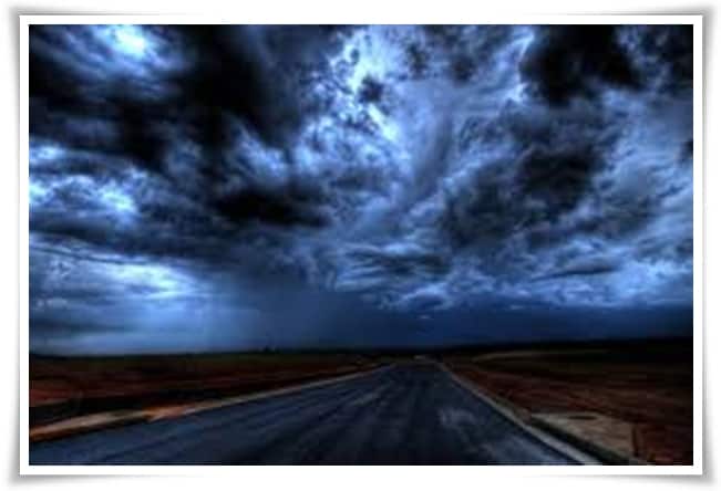 dark clouds on a lonely road